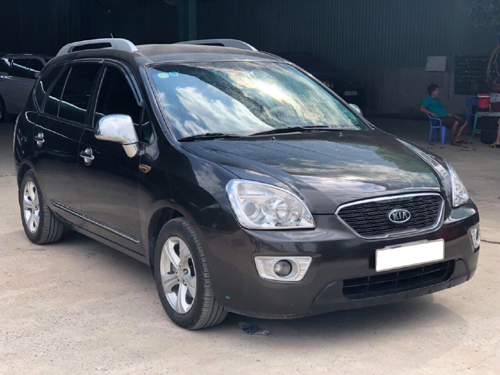 Bán nhanh xe Kia carens 2016 màu đen số sàn 7 chỗ, máy xăng