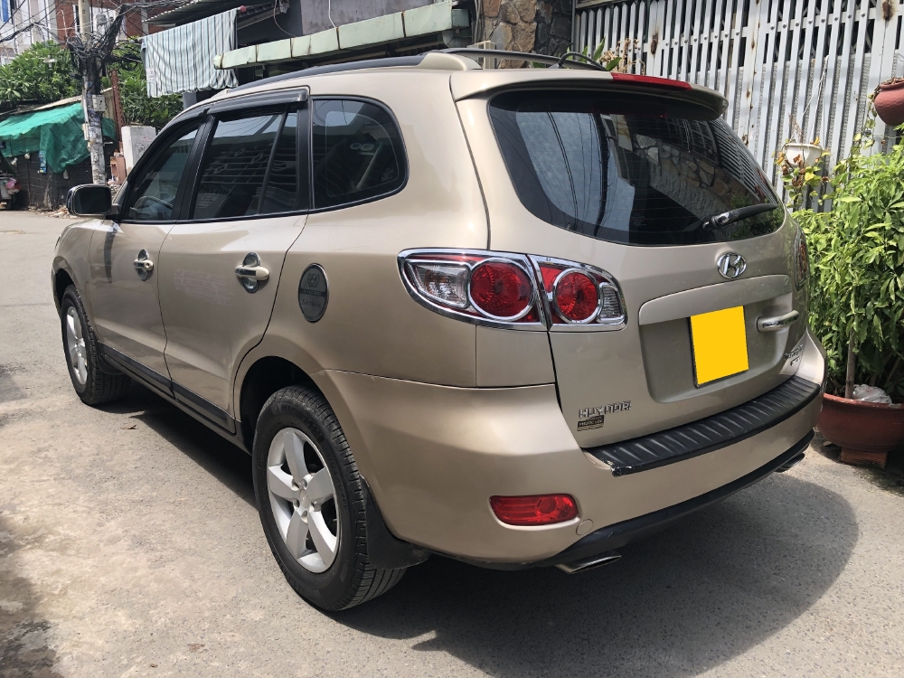 Về hưu bán xe santafe 2009, số sàn, màu vàng cát,