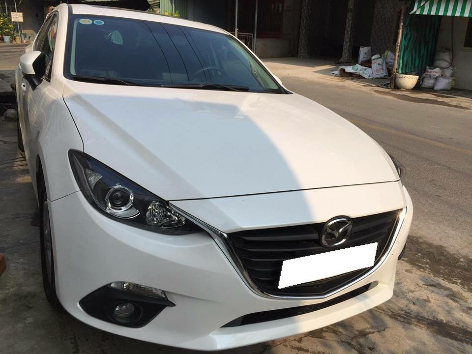 Cần bán xe Mazda 3 model 2016 số tự động màu trắng