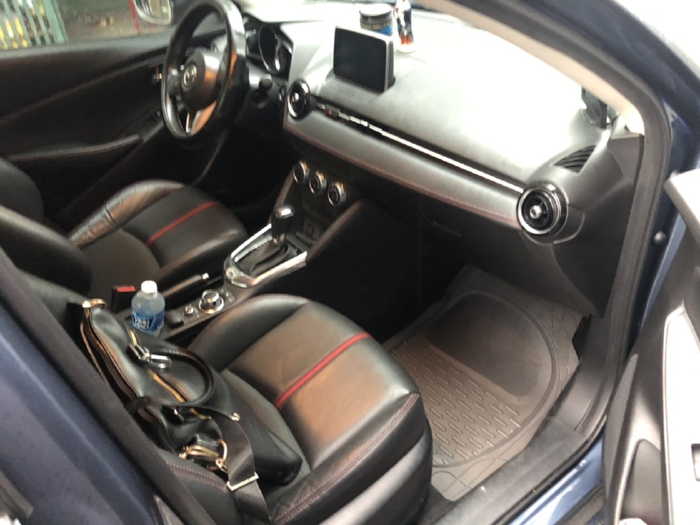 Bán Mazda 2 sedan 1.5AT màu xanh đá số tự động sản xuất 2016 biển Sài Gòn đi 14000km