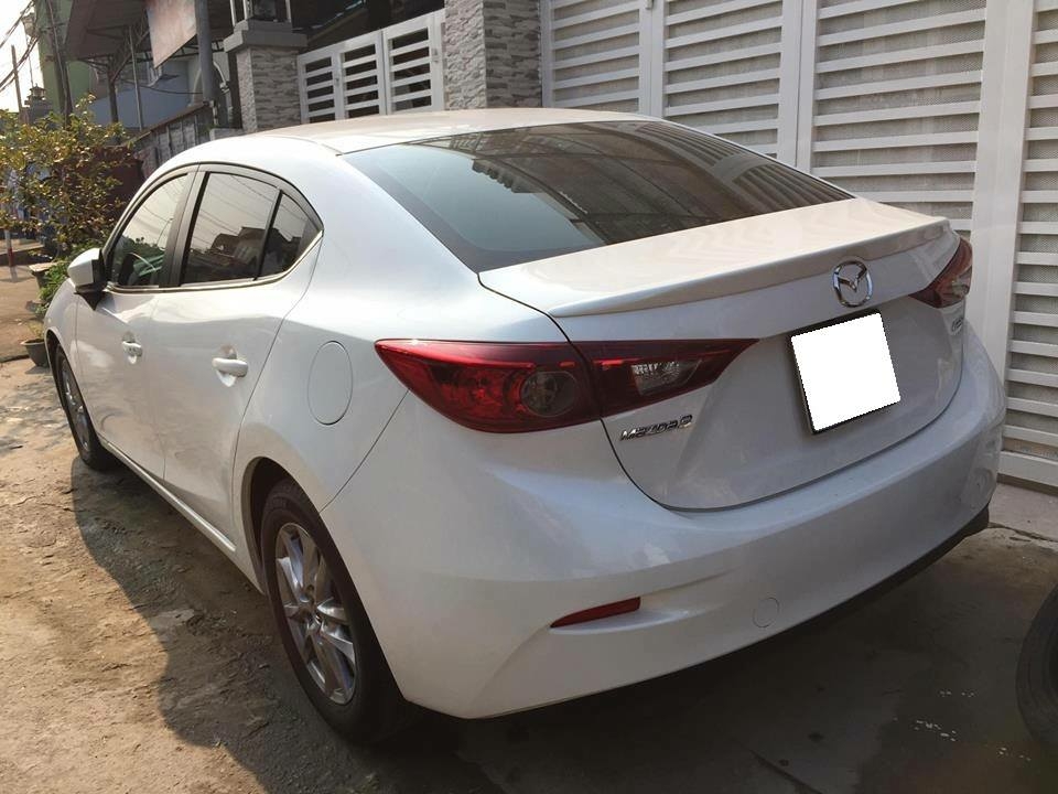 Cần bán xe Mazda 3 model 2016 số tự động màu trắng