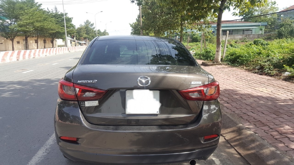 Bán Mazda 2 2016, màu nâu, đúng chất, xe nhập thái, giá TL, hổ trợ góp