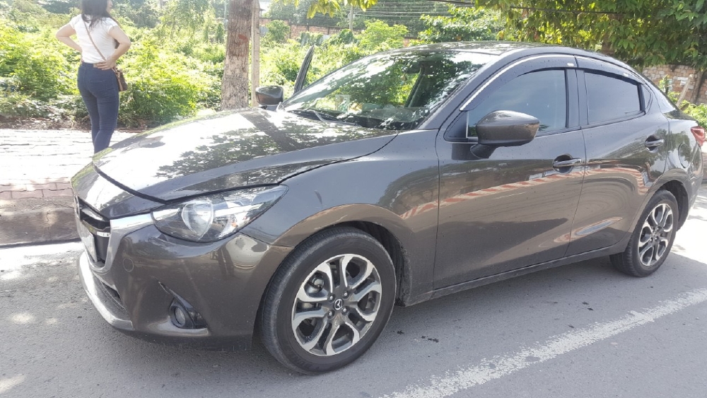 Bán Mazda 2 2016, màu nâu, đúng chất, xe nhập thái, giá TL, hổ trợ góp