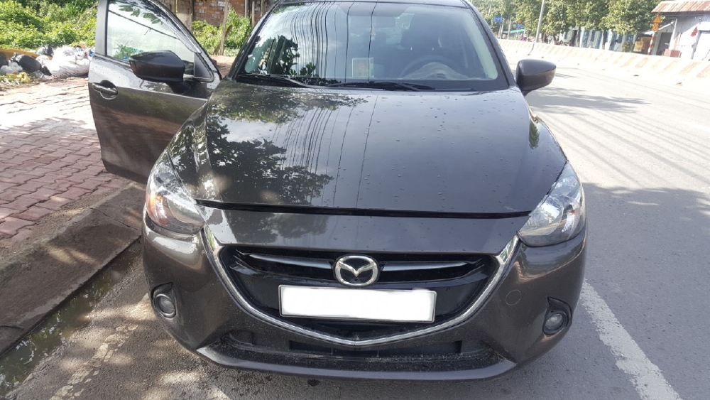Bán Mazda 2 2016, màu nâu, đúng chất, xe nhập thái, giá TL, hổ trợ góp