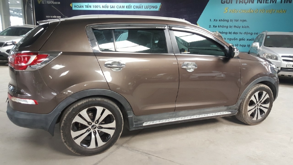 Bán Kia Sportage 2.0AT 2011 màu nâu biển SG