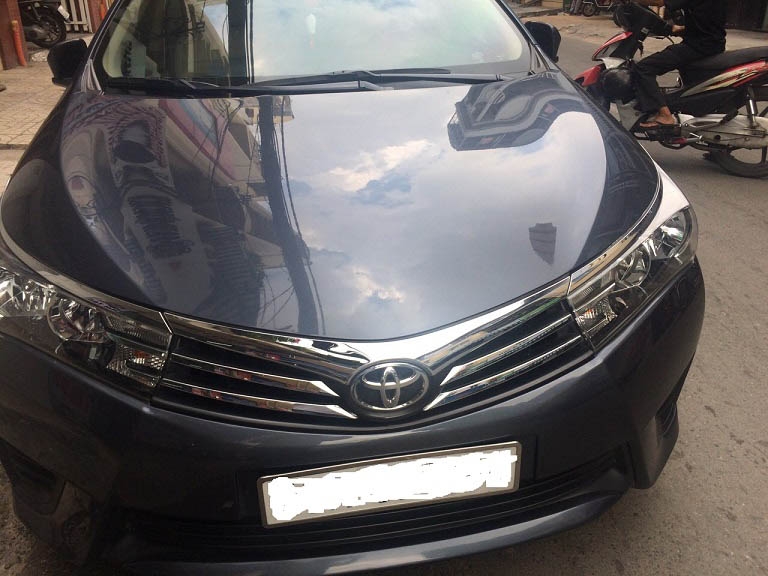 Cần bán xe Altis 2015, số sàn, máy xăng, màu xanh nhà dùng kỷ còn mới tinh