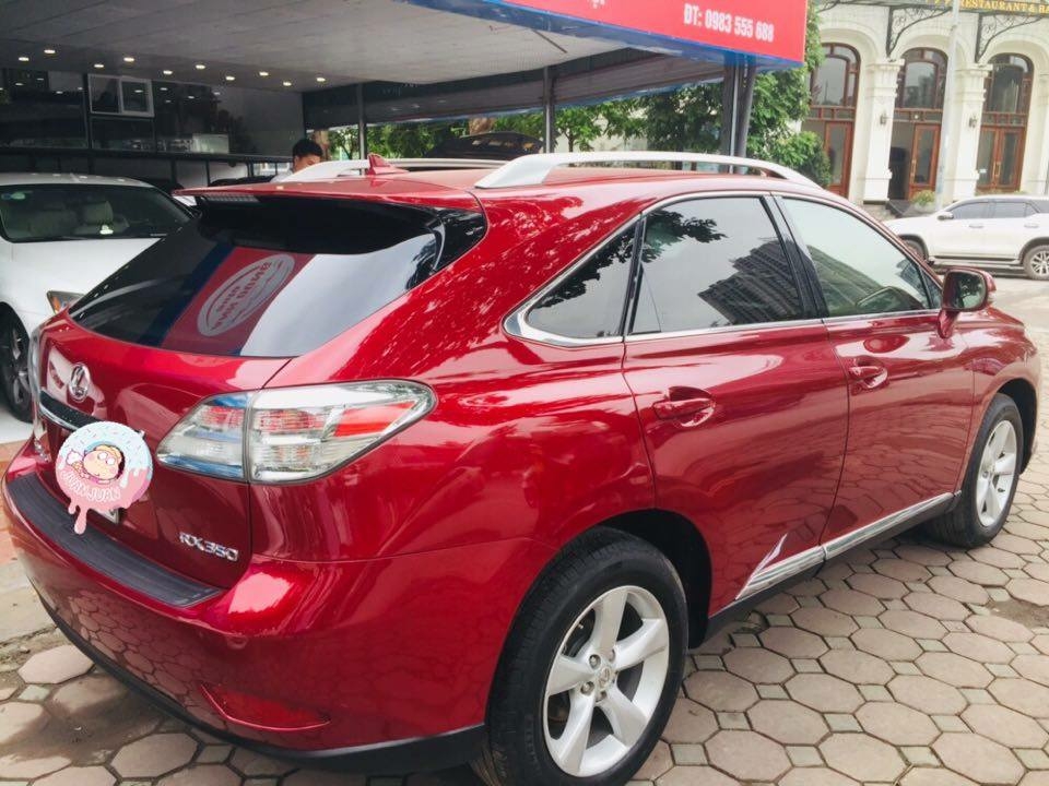 Lexus RX350, sản xuất 2009, đăng ký 2009. Động cơ V6 3.5L máy xăng, mầu đỏ, nội thất kem. Biển Hà Nội.