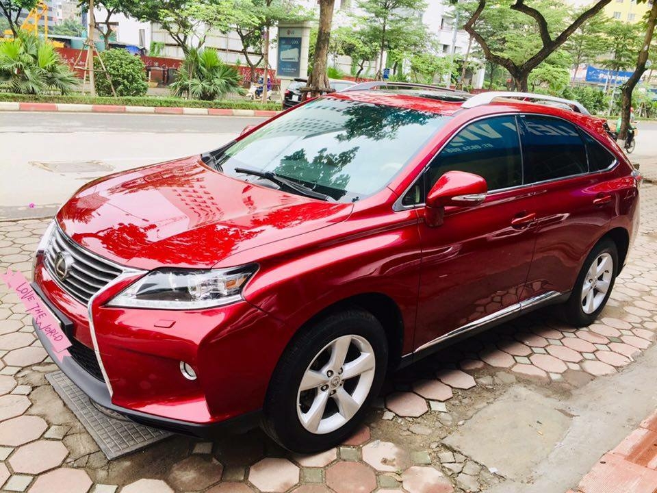 Lexus RX350, sản xuất 2009, đăng ký 2009. Động cơ V6 3.5L máy xăng, mầu đỏ, nội thất kem. Biển Hà Nội.