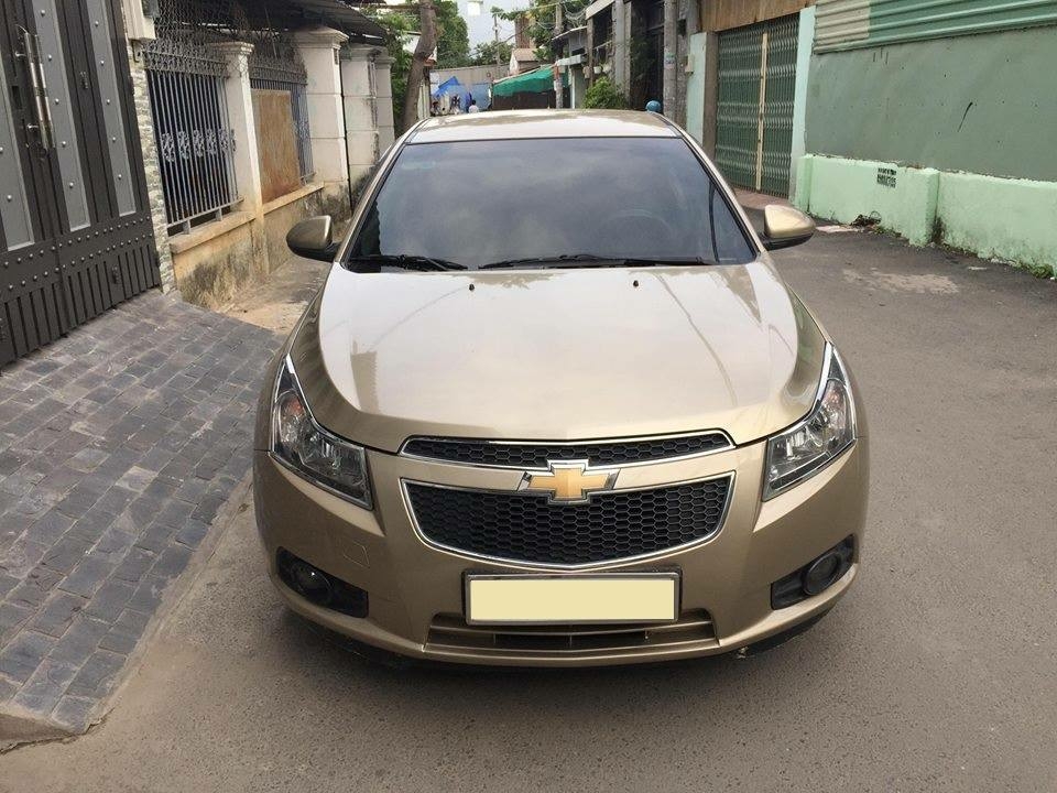 Cruze 2010, số sàn, màu vàng cát