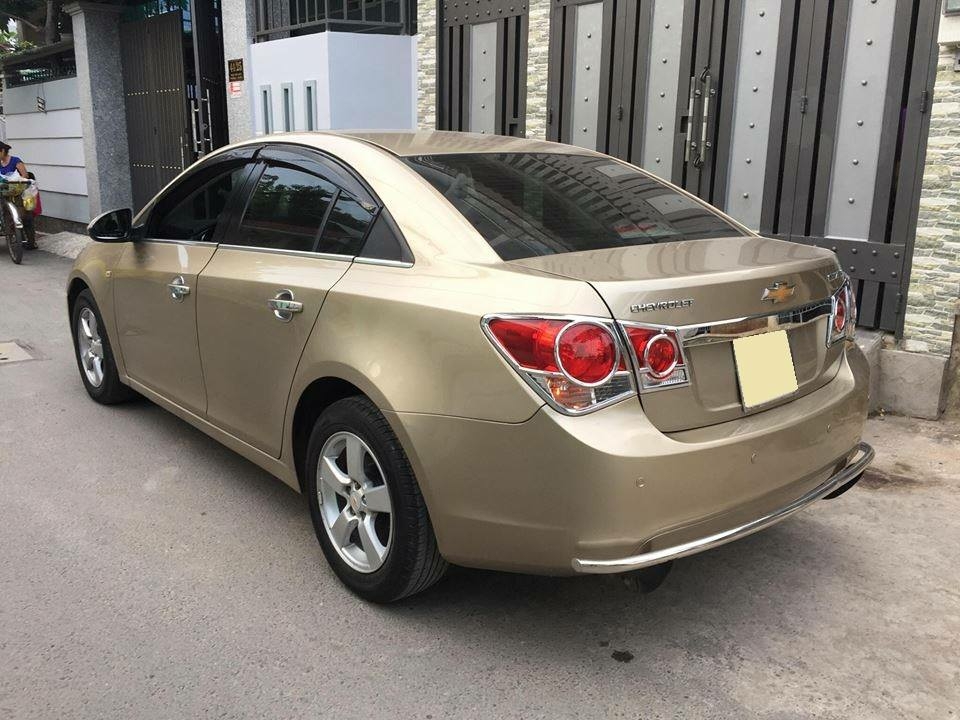Cruze 2010, số sàn, màu vàng cát