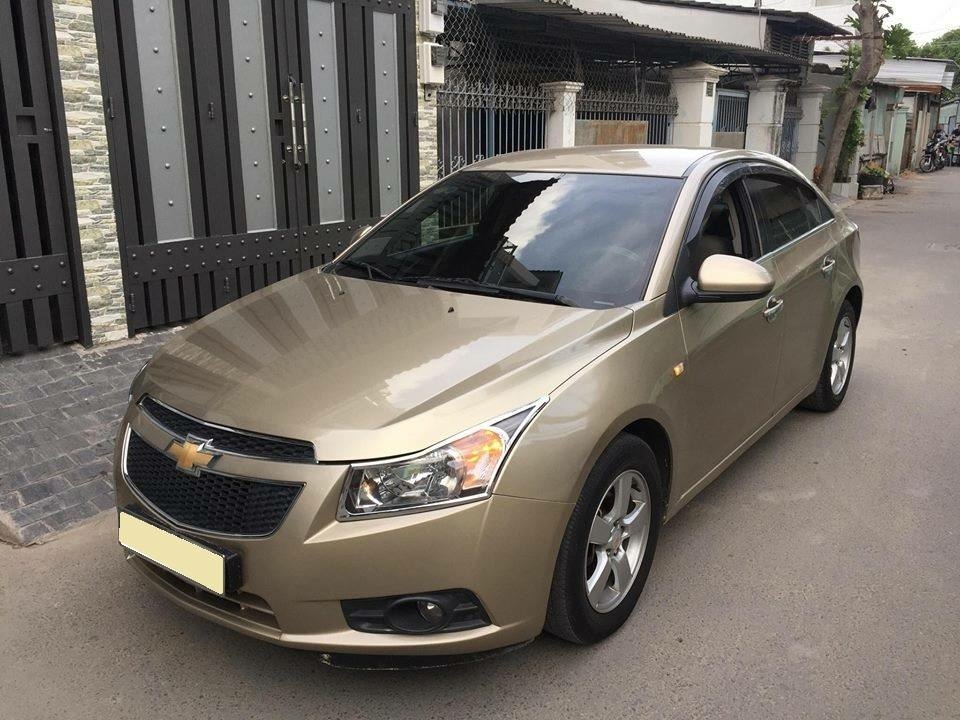 Cruze 2010, số sàn, màu vàng cát