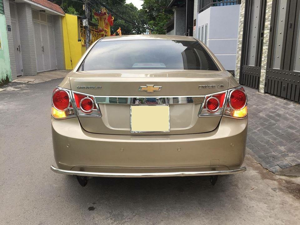 Cruze 2010, số sàn, màu vàng cát