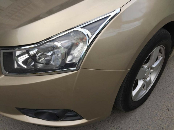 Cruze 2010, số sàn, màu vàng cát, gia đình sử dụng.