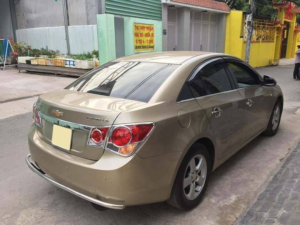 Cruze 2010, số sàn, màu vàng cát