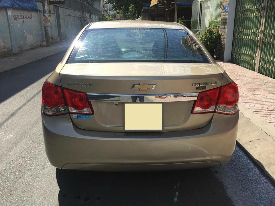 Bán Chevrolet Cruze LS 2011 số sàn màu vàng chính chủ