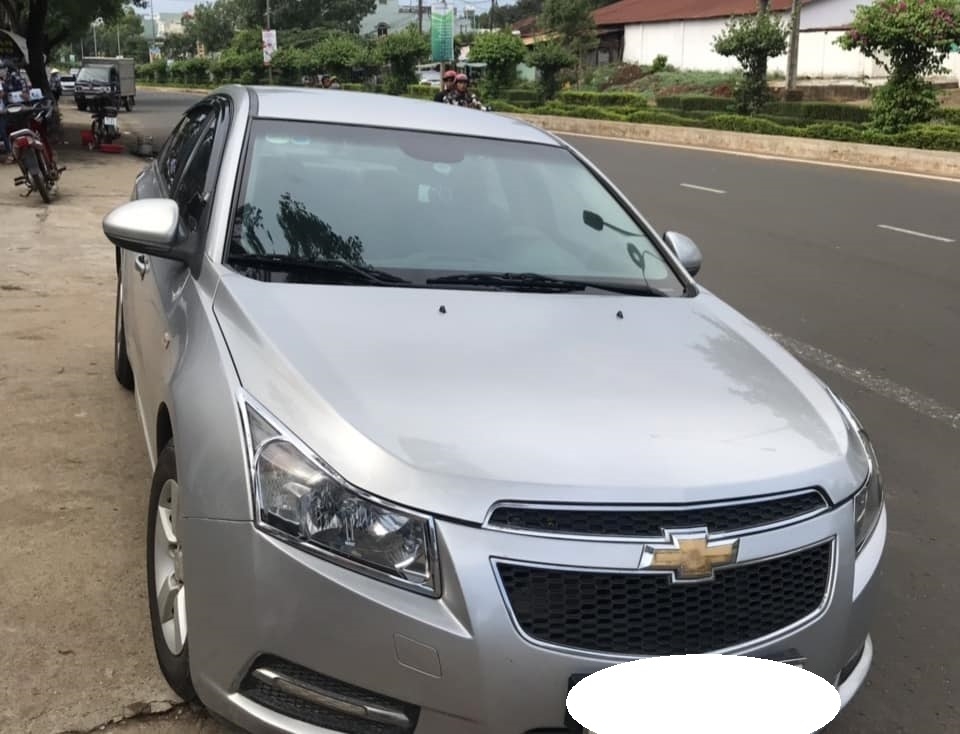 Cruze đời 2012 số sàn màu bạc