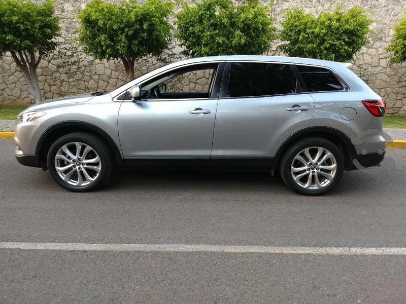 Gia đình cần bán xe Mazda Cx9, 2015, số tự động, bản full, màu bạc
