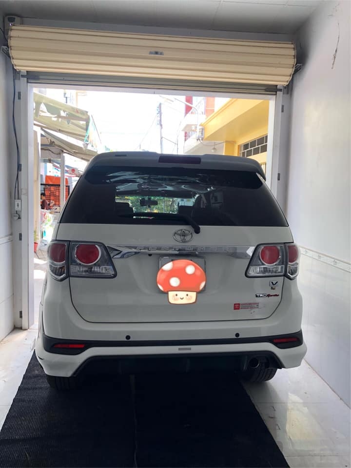 Bán Toyota Fortuner sportivo 2014 tự động trắng xe zin đẹp lọng lẫy.