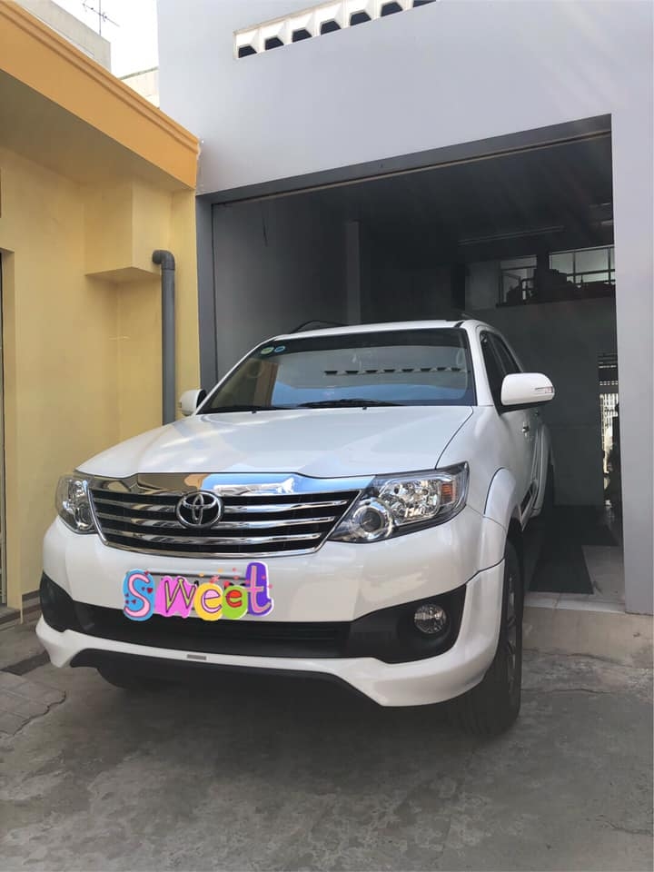 Bán Toyota Fortuner sportivo 2014 tự động trắng xe zin đẹp lọng lẫy.