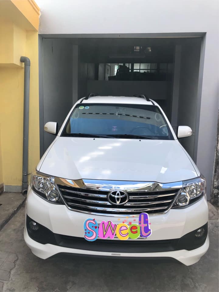 Bán Toyota Fortuner sportivo 2014 tự động trắng xe zin đẹp lọng lẫy.