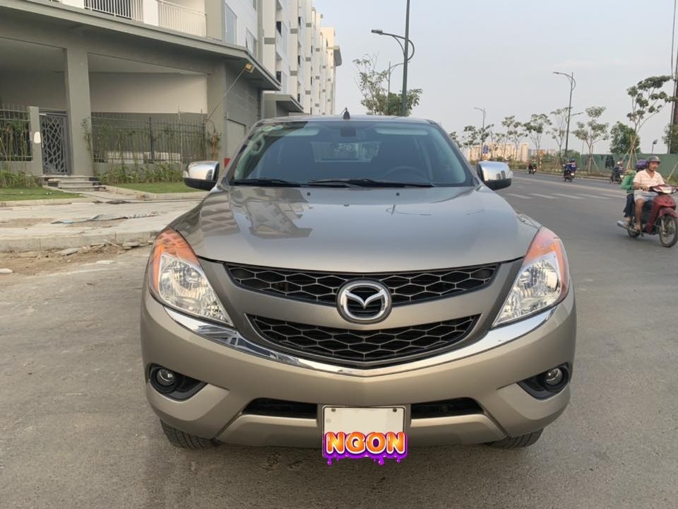 Cần bán xe BT50, sản xuất 2014, số sàn, máy dầu, hai cầu, màu ánh kim