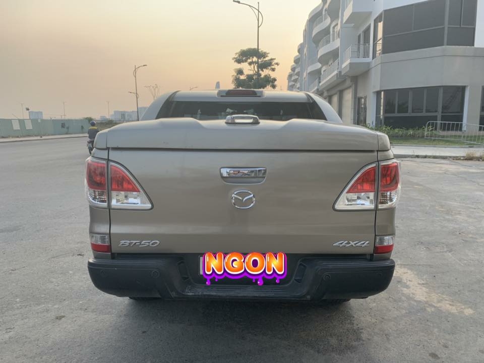 Cần bán xe BT50, sản xuất 2014, số sàn, máy dầu, hai cầu, màu ánh kim
