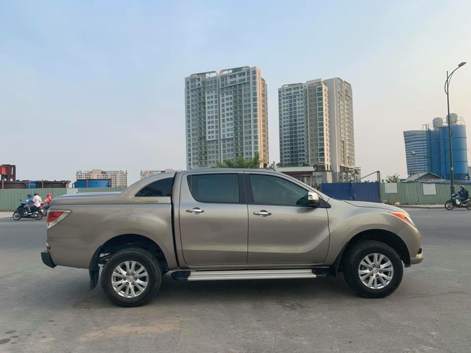 Cần bán xe BT50, sản xuất 2014, số sàn, máy dầu, hai cầu, màu ánh kim