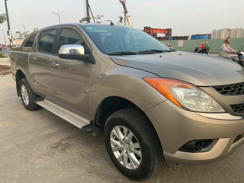 Cần bán xe BT50, sản xuất 2014, số sàn, máy dầu, hai cầu, màu ánh kim