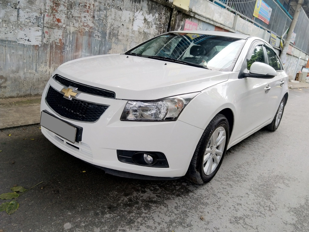 Mình Bán Chevrolet Cruze LT 2016 màu trắng số sàn đi kỹ