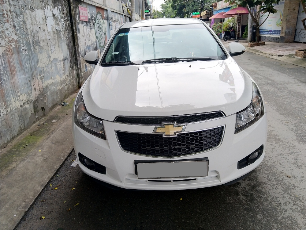 Mình Bán Chevrolet Cruze LT 2016 màu trắng số sàn đi kỹ