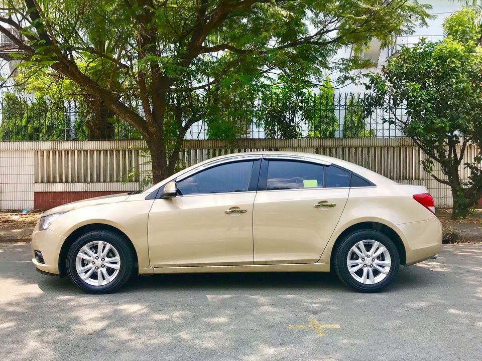 Bán Chevrolet Cruze 2016 số sàn màu vàng xe cực đẹp