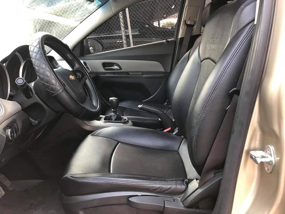 Cần bán xe Cruze 2015, số sàn, màu vàng cát, còn mới tinh