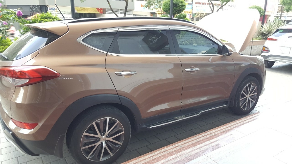Hyundai Tucson 2015 2.0AT màu nâu xe nhập
