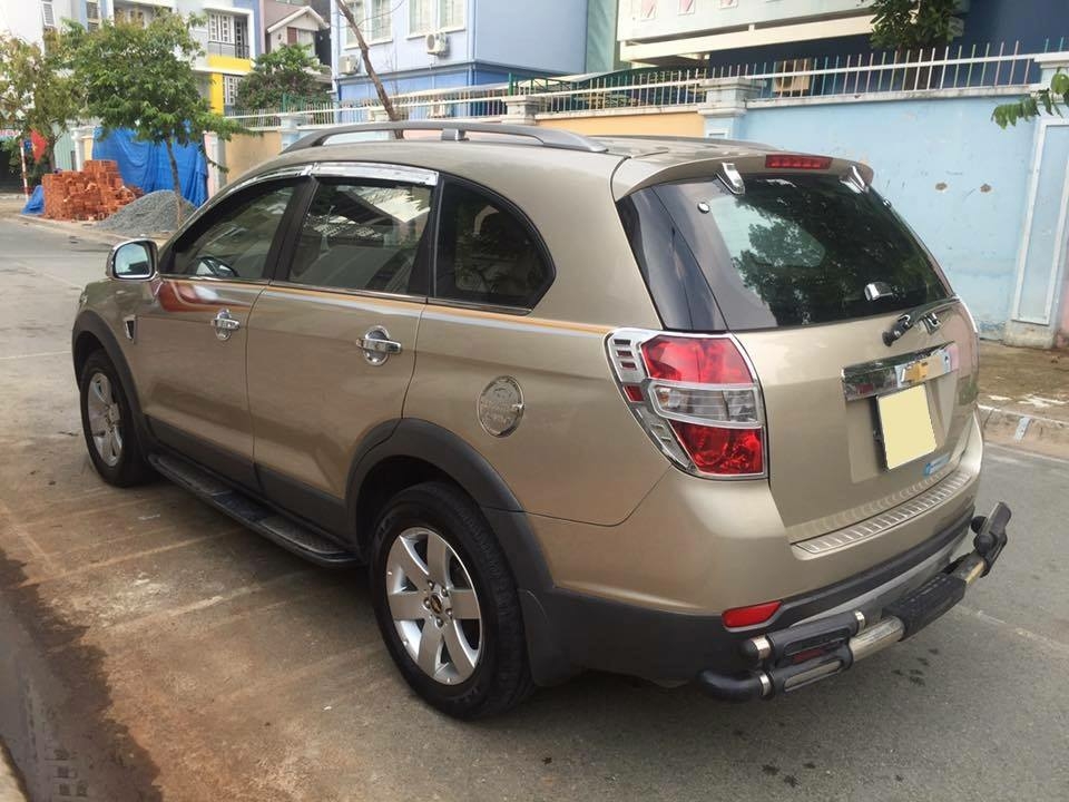 Bán gấp Captiva 2009 số sàn màu vàng xe một chủ.