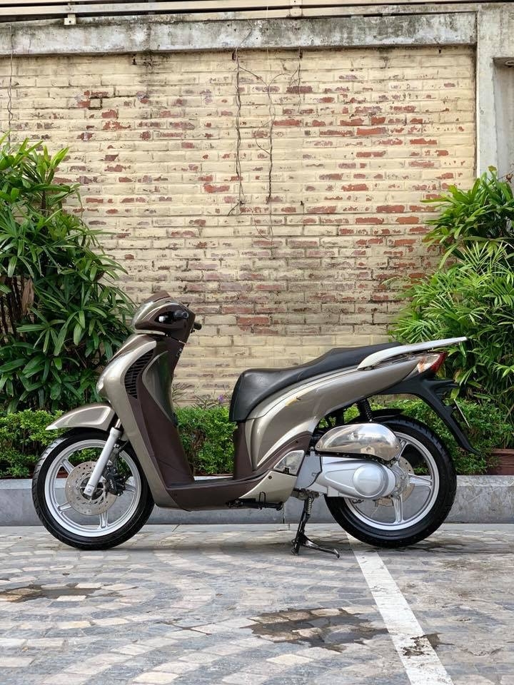 Cần bán SH Nhập 125 cuối 2013 màu Sâmpanh- Biển Vip