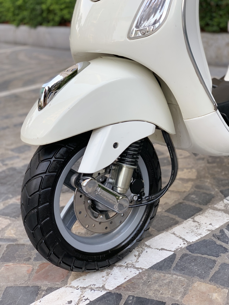 Cần bán Vespa LX 3Vie 2014 màu Trắng dán kín nilon cả xe- Chất