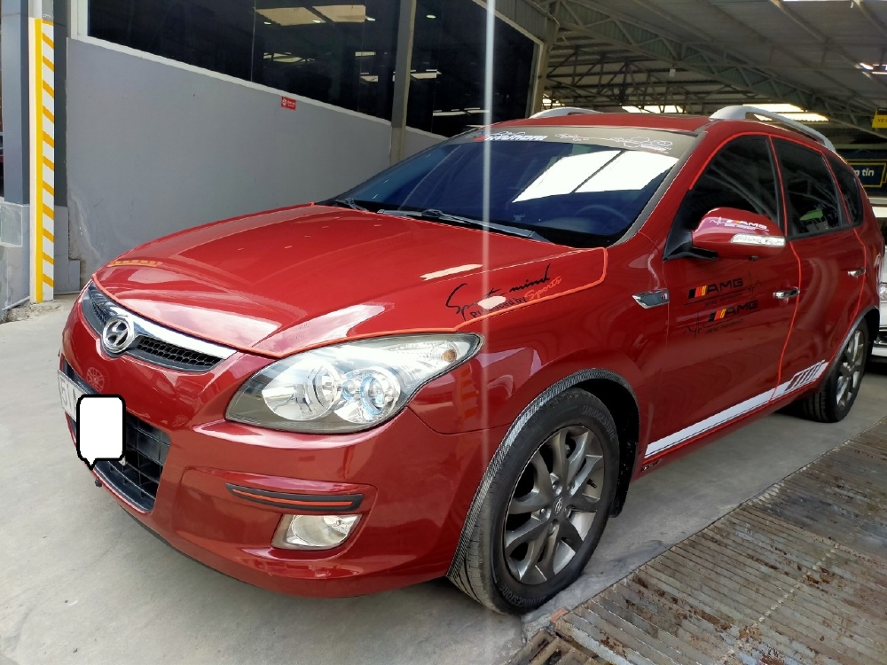 Hyundai I30 CW 1.6AT 2010 màu đỏ biển SG xe siêu đẹp