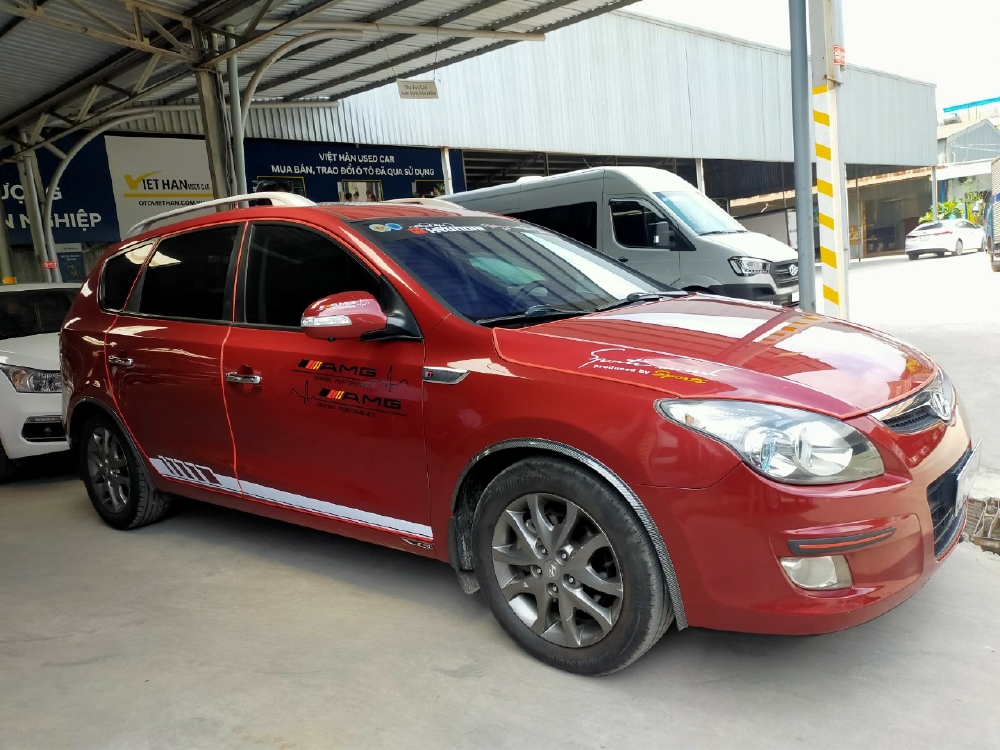 Hyundai I30 CW 1.6AT 2010 màu đỏ biển SG xe siêu đẹp
