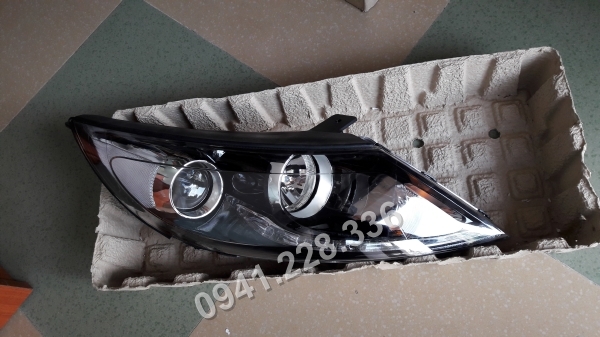 921023W111/921013W111  ĐÈN PHA SPORTAGE