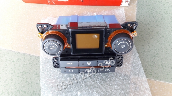 972501DAE2WK Bảng điều khiển điều hòa Kia Caren