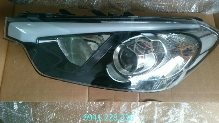0K2N151030A Đèn pha phải Kia Spectra
