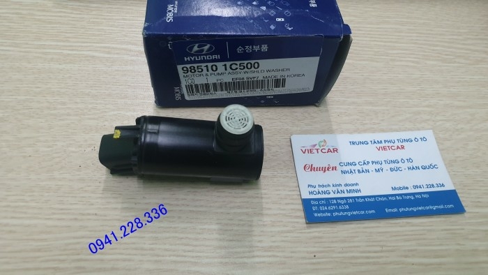 985101C500 Mô tơ xịt nước rửa kính Kia Forte, Hyundai Getz