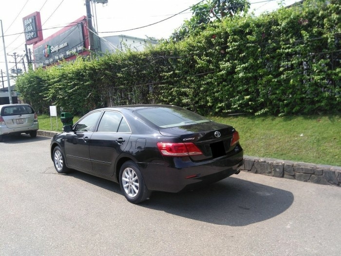 Bán Toyota Camry 2.4 model 2011, số tự động, màu Đen bóng