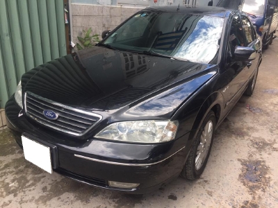 Cần bán xe Mondeo 2003, số tự động màu đen, gia đình sử dụng kỷ nên còn rất mới