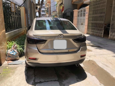 Cần bán xe Mazda 2 2017 số tự động màu vàng cát, nội thất đen rất đẹp, xe 1 đời chủ bstp