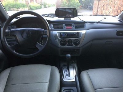 Bán Mitsubishi Lancer 2004 đk 2005 tự động xanh đen chính chủ