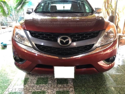 Cần bán xe  Bt50, sản xuất 2013, số sàn, máy dầu, 2 cầu, màu đỏ,