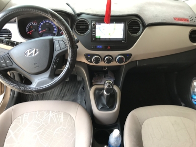 Bán Hyundai Grand i10 sedan 1.2MT màu nâu titan số sàn bản đủ sản xuất 2018 mới 99%