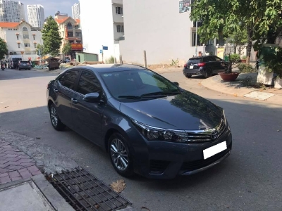 Cần tiền bán xe ô tô Altis 2015, sô sàn, màu xanh, nhà dùng rất kỷ nên còn rất mới.