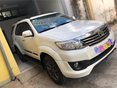 Bán Toyota Fortuner sportivo 2014 tự động trắng xe zin đẹp lọng lẫy.